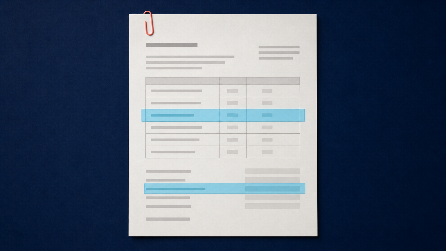Business document with cyan layout highlights on a navy desk